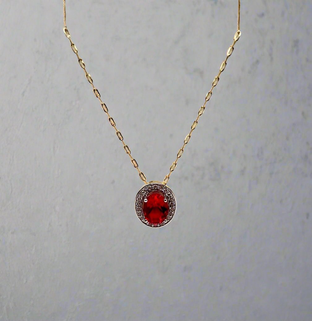 Ruby Pendant In 9ct Gold With Diamond Surround